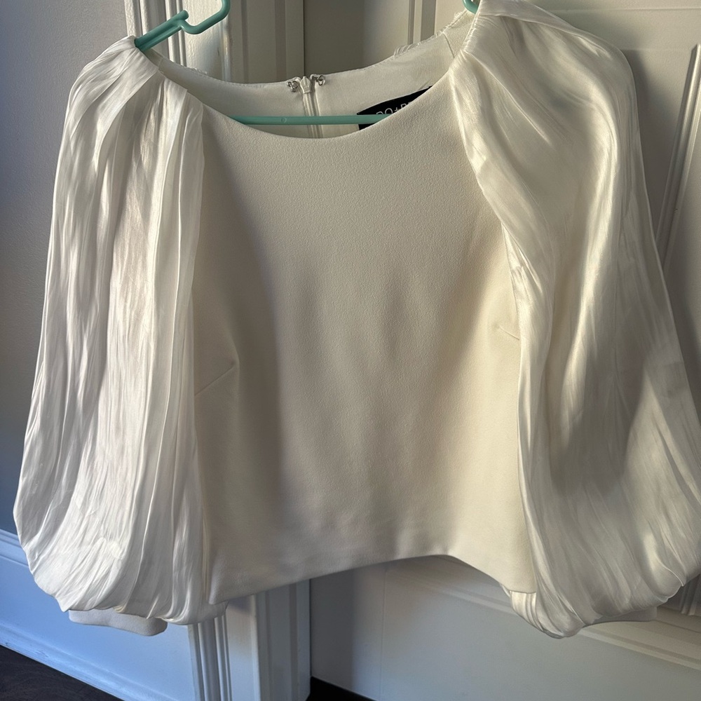 Elegant White Blouse with Flowing Sleeves